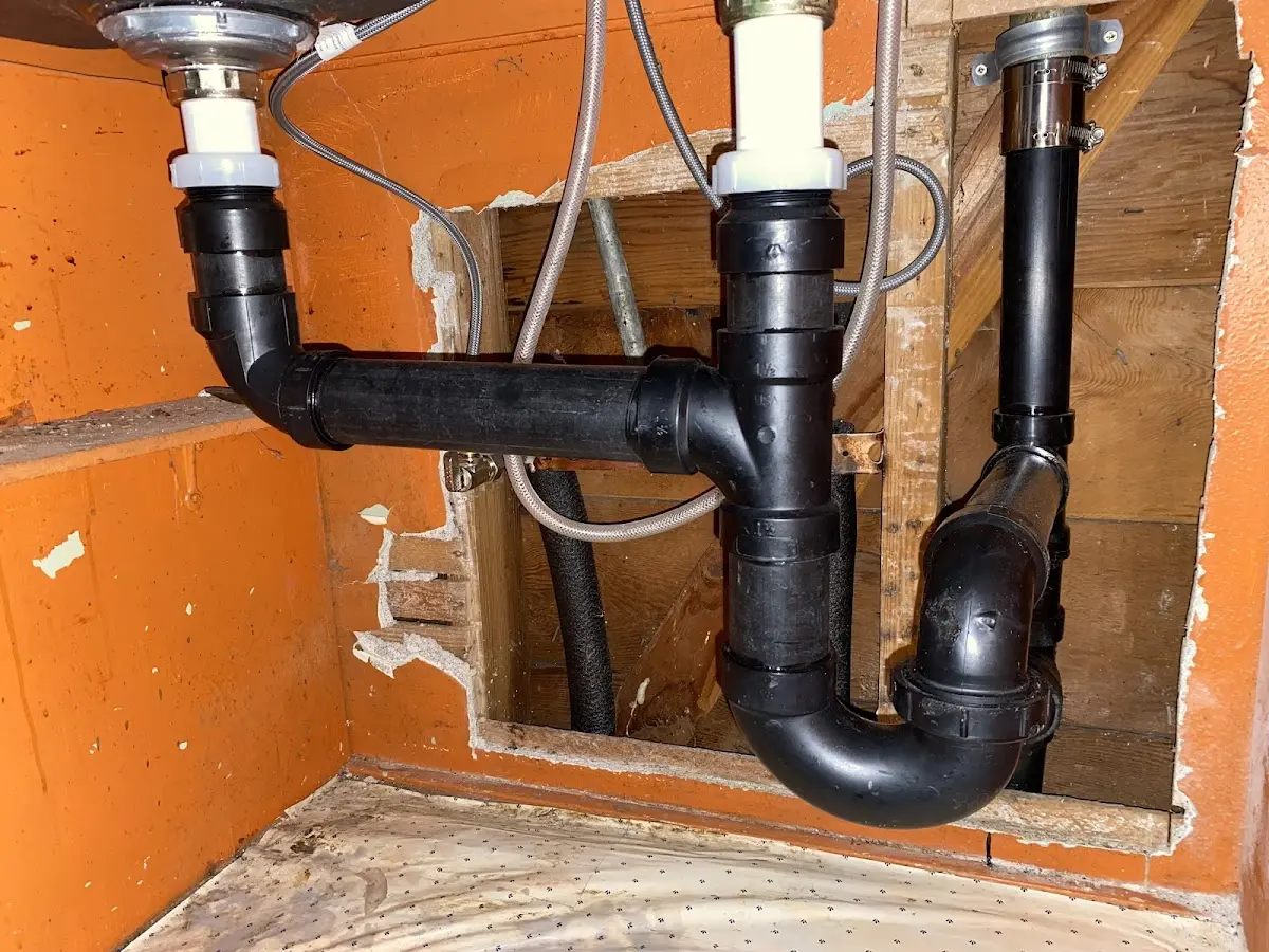 Professional Garbage Disposal Repair equipment and tools on the job in Ogden